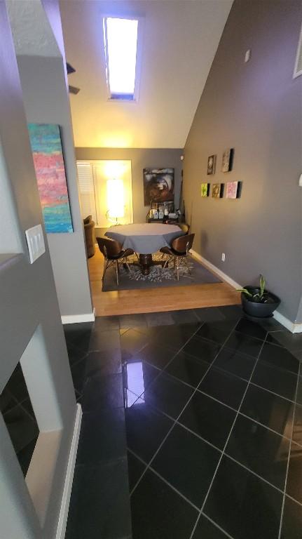 12410 Twin Creek Rd, Manchaca, TX 78652 - bedroom with baseboards, lofted ceiling, and granite finish floor