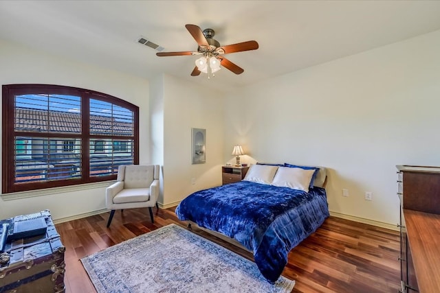 bedroom featuring dark wood-type flooring and ceiling fan