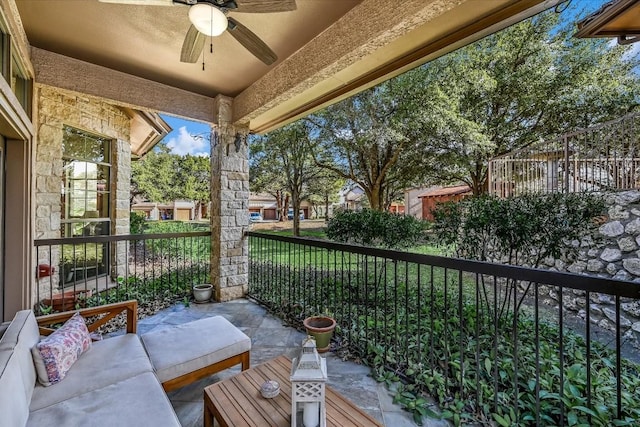 view of patio / terrace featuring ceiling fan