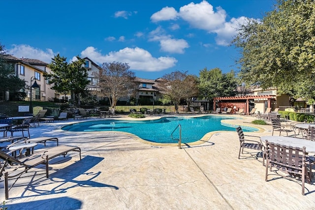 view of pool with a pergola, a patio area, and a jacuzzi