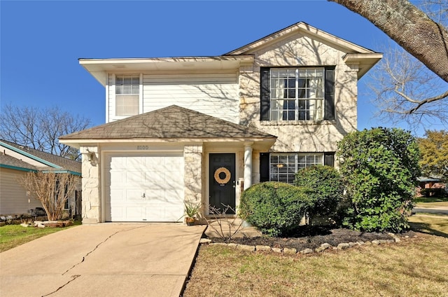 view of front of home with a garage