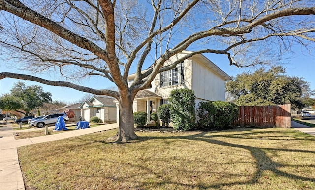 view of front facade with a front yard