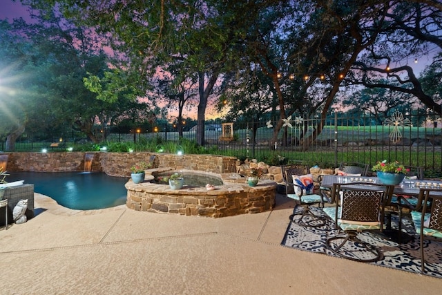 104 Fenway Ct, Lakeway, TX 78734 - view of pool with a patio, a pool with connected hot tub, and outdoor dining space