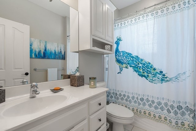 full bathroom with vanity, shower / tub combo, and toilet