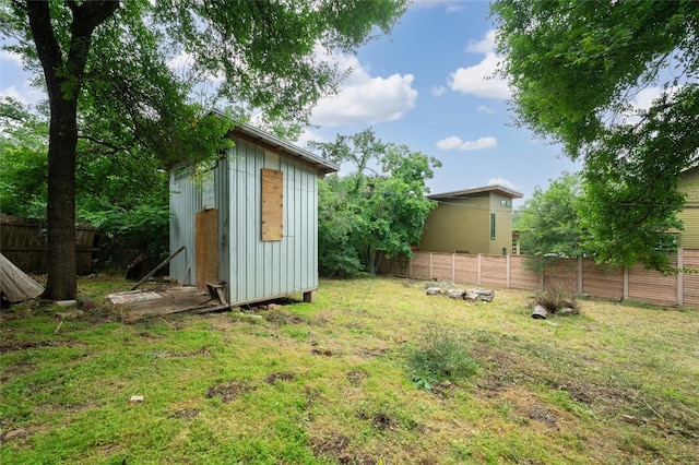 exterior space with a shed