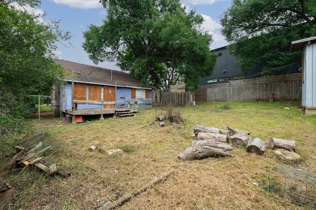 view of yard with a wooden deck