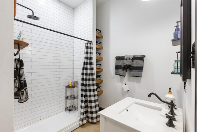 bathroom featuring vanity and a shower with curtain