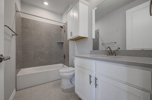 full bathroom with tub / shower combination, vanity, toilet, and tile patterned floors