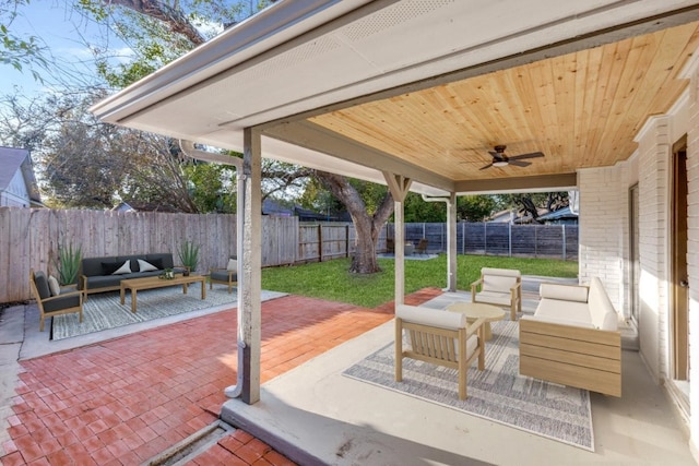 view of patio with ceiling fan and an outdoor hangout area