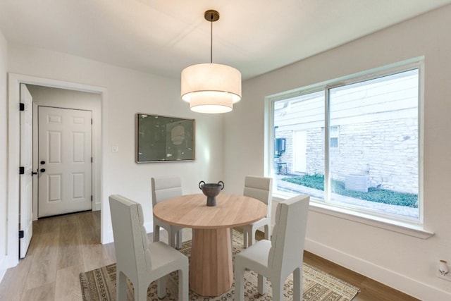 dining room featuring light wood-type flooring