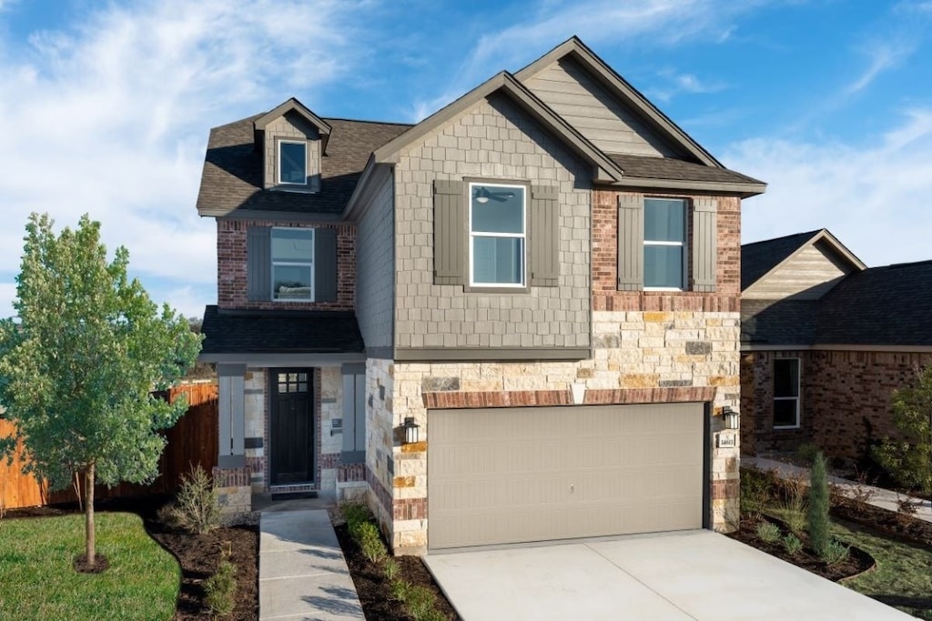 craftsman-style house featuring a garage