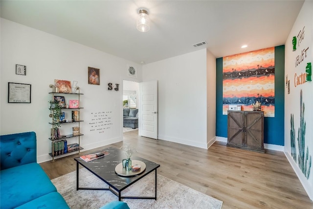 living room with hardwood / wood-style flooring