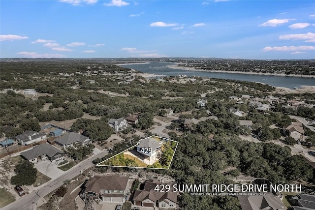 429 Summit Ridge Dr N, Point Venture, TX 78645 - aerial view of residential area with a nearby body of water and property parcel outlined
