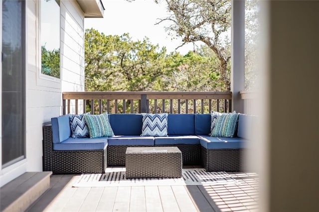 wooden deck with outdoor lounge area