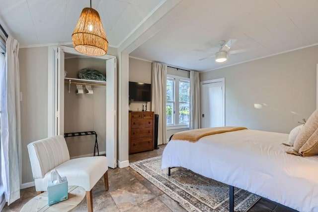 bedroom with crown molding and ceiling fan