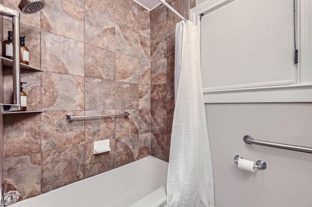 bathroom featuring shower / bath combo with shower curtain