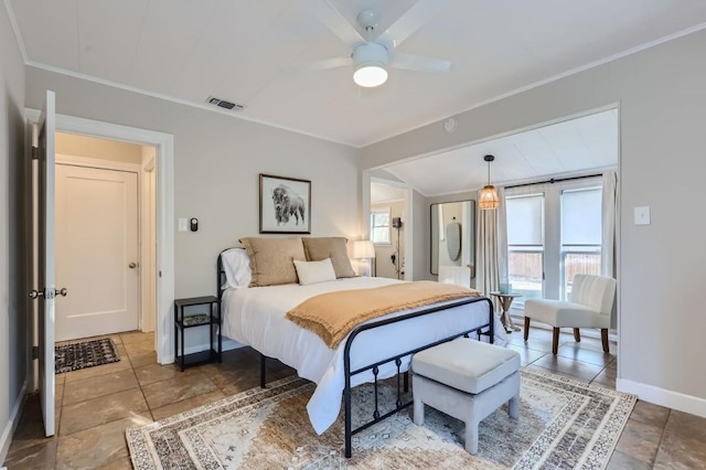 bedroom with ceiling fan and ornamental molding