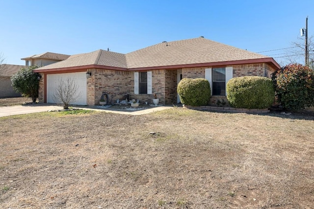 single story home featuring a garage