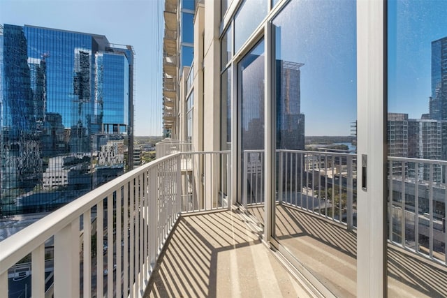 balcony featuring a city view