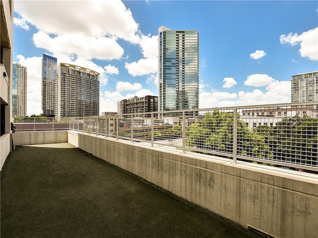 balcony featuring a view of city