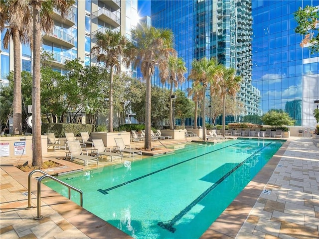 pool with a patio area