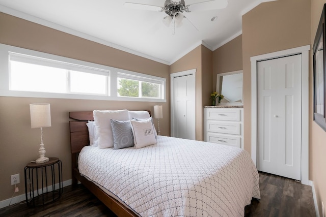 bedroom featuring dark wood-type flooring, vaulted ceiling, ornamental molding, and ceiling fan