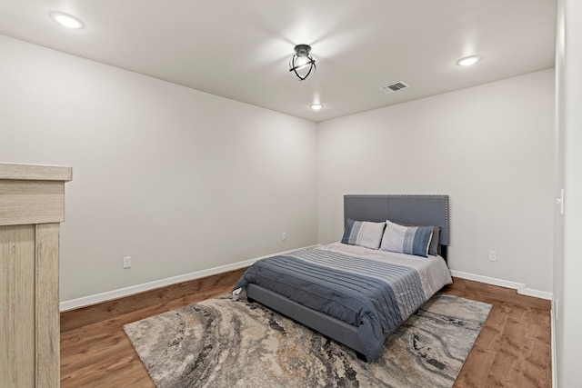 bedroom featuring wood-type flooring