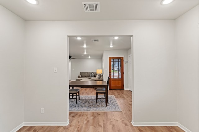 office with light hardwood / wood-style flooring