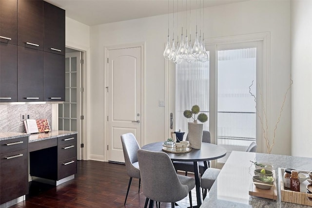 dining room featuring dark hardwood / wood-style floors