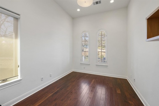 empty room with wood-type flooring