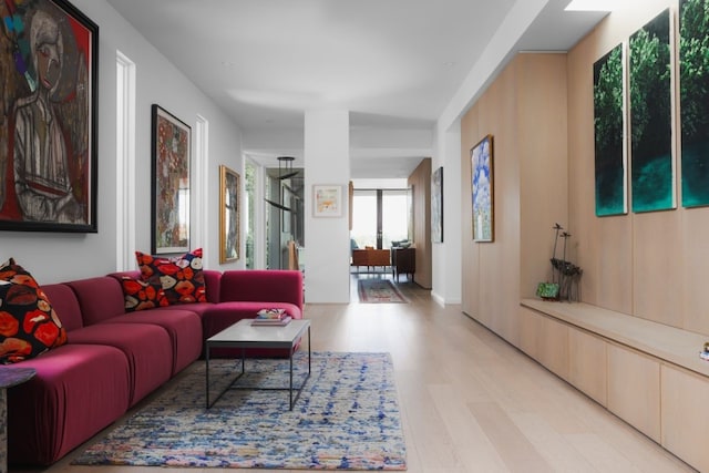 living room with light hardwood / wood-style floors