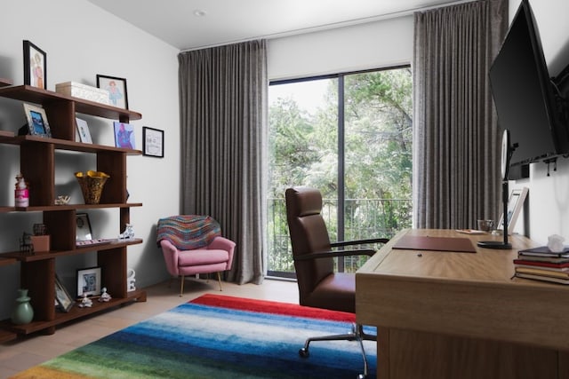 office space with light wood-type flooring