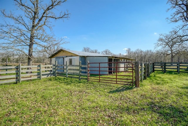 view of outdoor structure with a rural view