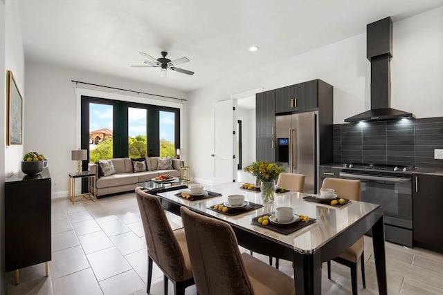 dining area featuring light tile patterned floors, french doors, and ceiling fan