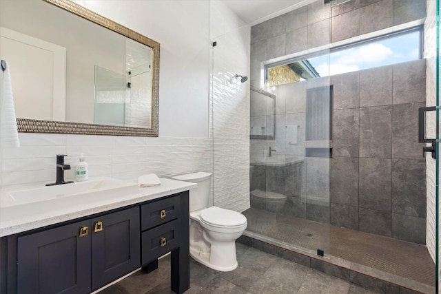 bathroom featuring walk in shower, toilet, tile walls, vanity, and backsplash