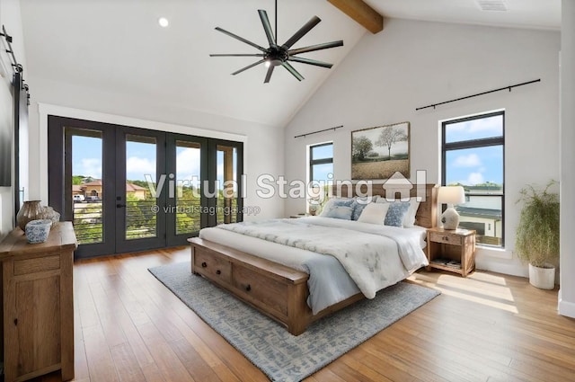 bedroom with beam ceiling, wood-type flooring, high vaulted ceiling, and access to outside