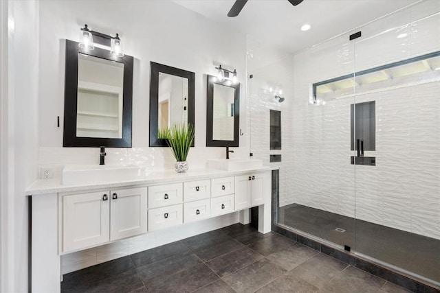 bathroom featuring vanity, tiled shower, backsplash, and ceiling fan