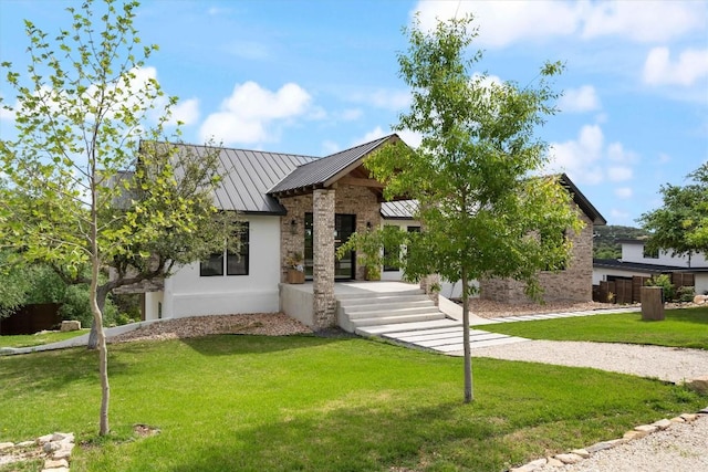 view of front of property with a front lawn