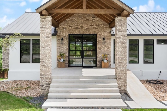 view of exterior entry with french doors