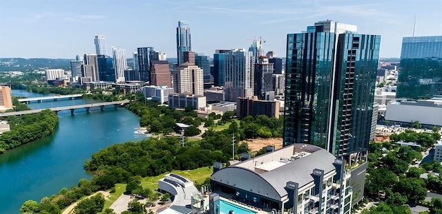 property's view of city with a water view