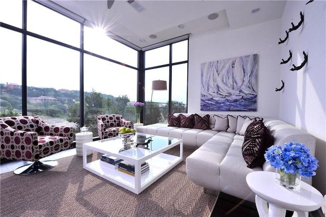 living room with floor to ceiling windows