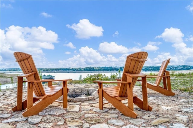 view of patio / terrace with a water view