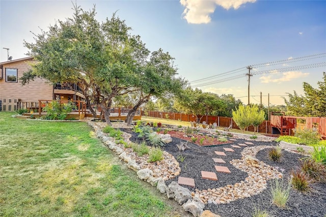 view of yard with a deck