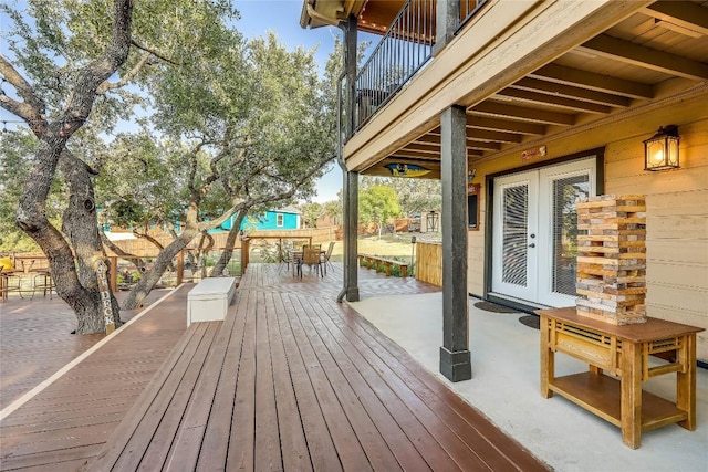 wooden terrace featuring french doors