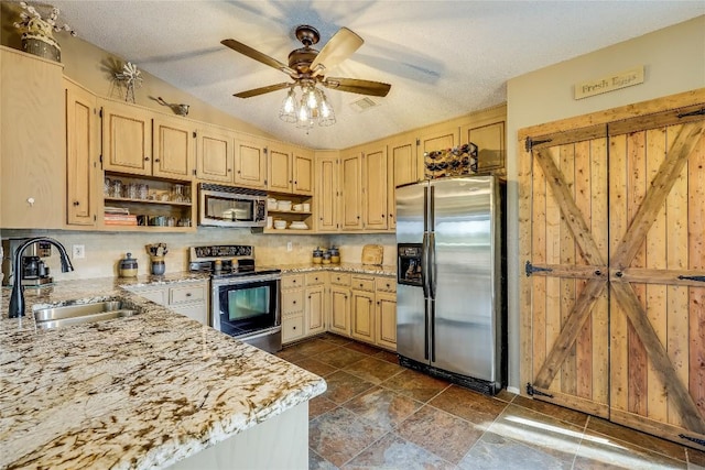 3709 Alamo Cv, Lago Vista, TX 78645 - kitchen with appliances with stainless steel finishes, open shelves, a sink, light brown cabinetry, and a textured ceiling
