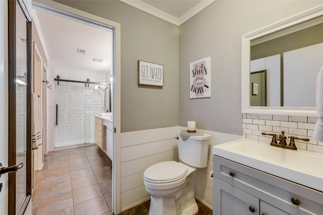 bathroom featuring crown molding, vanity, tasteful backsplash, a shower with shower door, and toilet