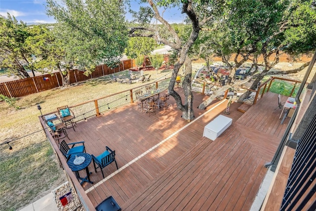 3709 Alamo Cv, Lago Vista, TX 78645 - wooden deck featuring outdoor dining area