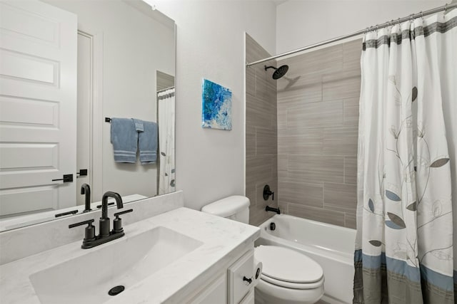 full bathroom featuring vanity, shower / tub combo, and toilet