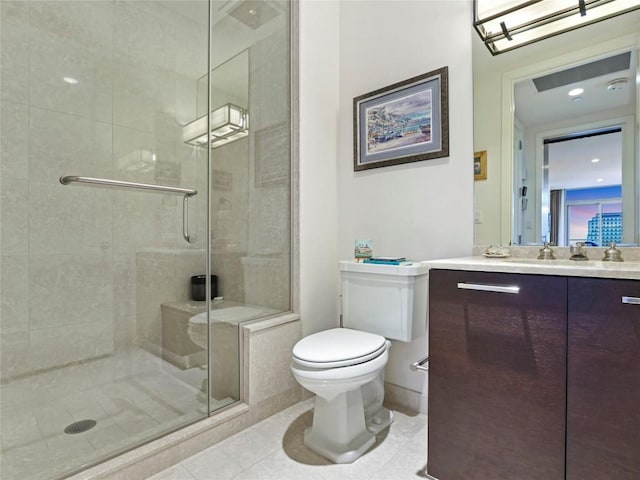 bathroom with an enclosed shower, vanity, tile patterned floors, and toilet