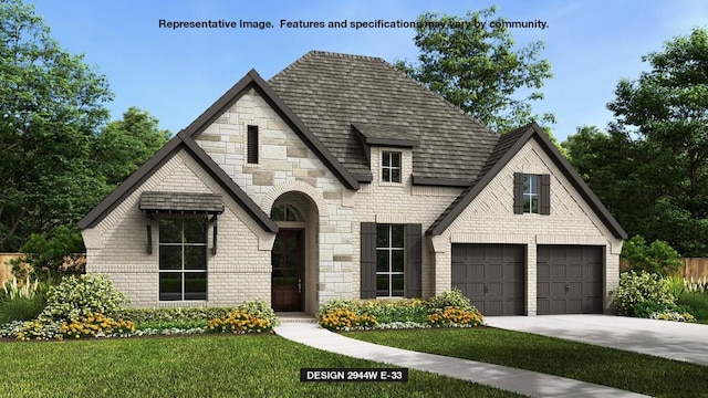 view of front of property featuring a garage and a front lawn